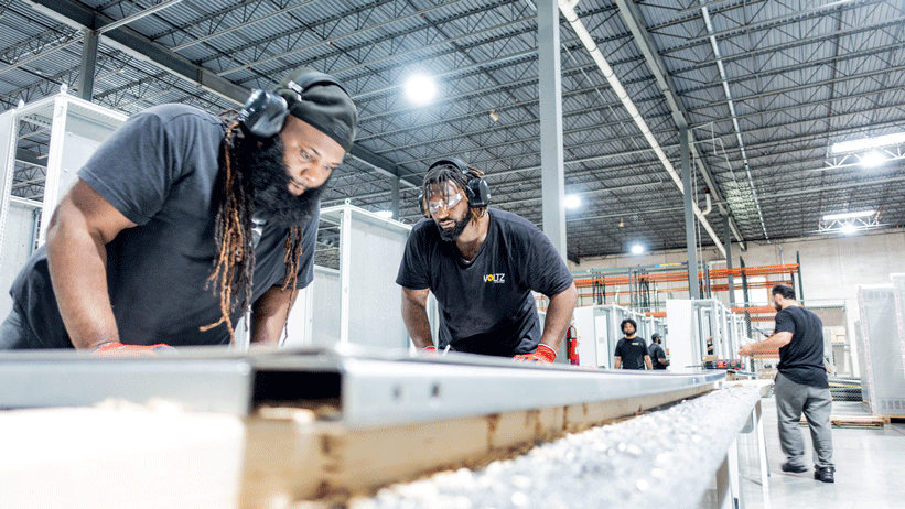 Engineering review on the production floor representing streamlined submittals and faster approvals